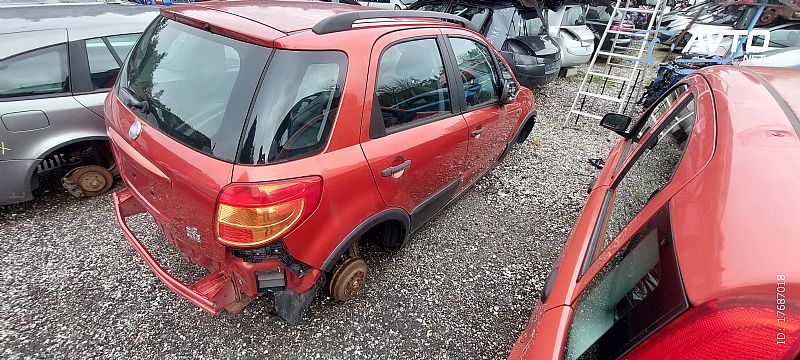 FIAT SEDICI. SUZUKI SX4 DELI